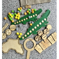 Zestaw " Afryka" - ( układanka lewopólkulowa, cykl rozwojowy, drewniane stemple z tropami zwierząt mieszkających w Afryce))