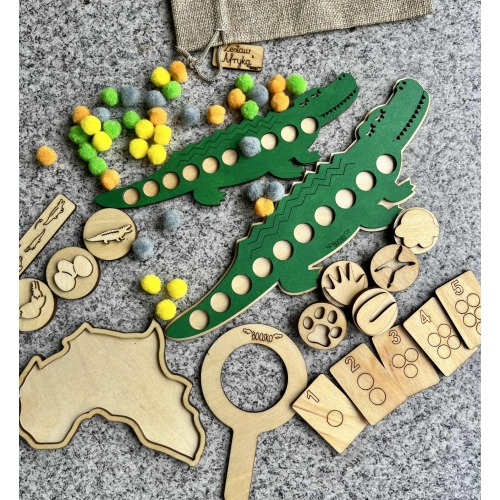 Zestaw " Afryka" - ( układanka lewopólkulowa, cykl rozwojowy, drewniane stemple z tropami zwierząt mieszkających w Afryce))